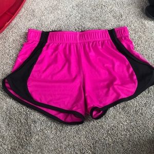 REEBOK pink shorts.